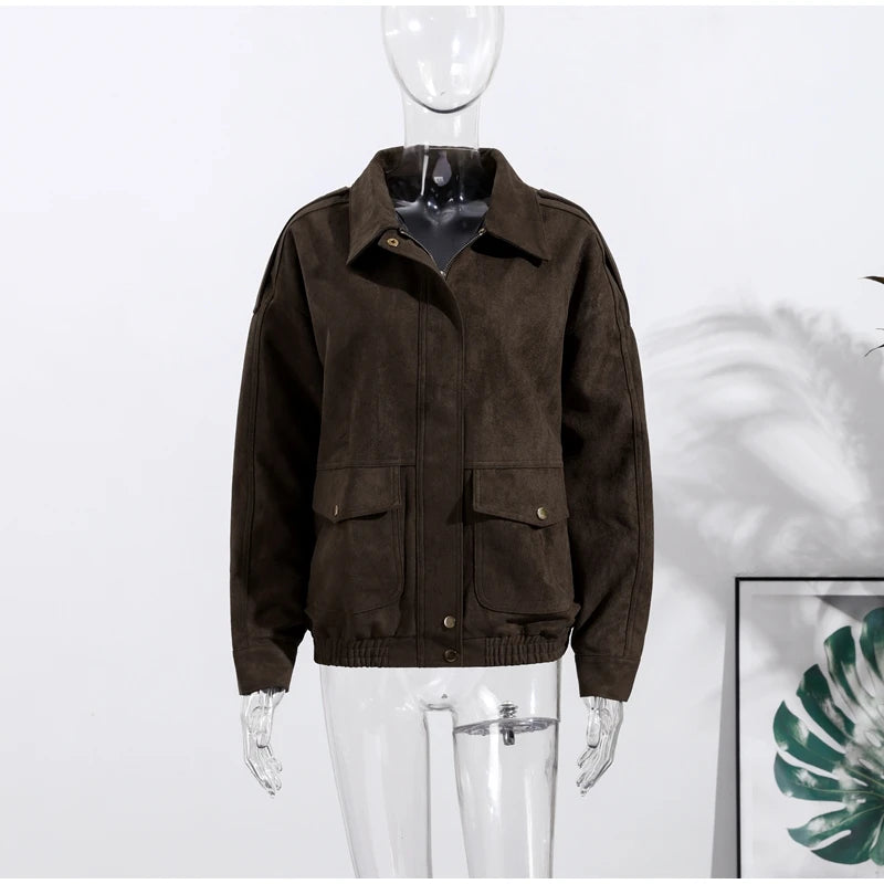 Brown jacket on a mannequin against a white background