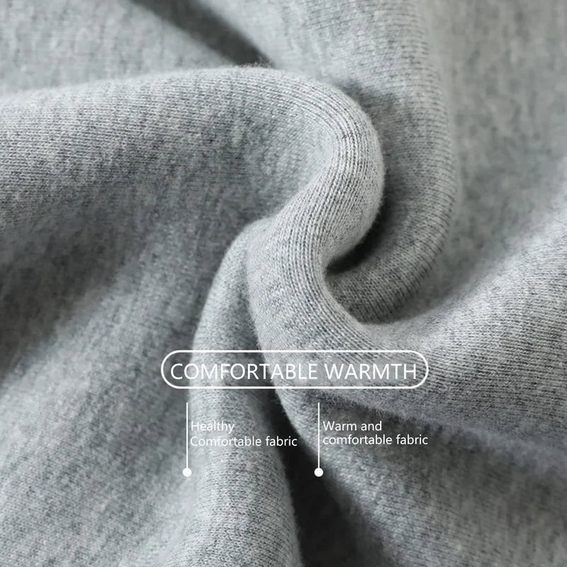 Close-up of gray fabric with text 'Comfortable Warmth' and 'Healthy Comfortable Fabric'.