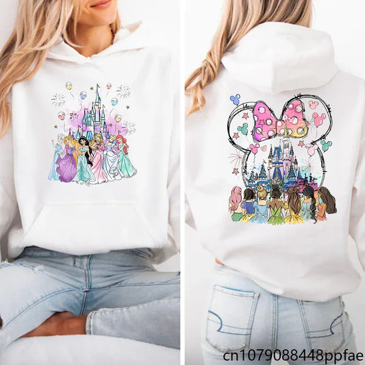 White hoodie with Disney-themed designs on front and back, featuring princesses and a castle.