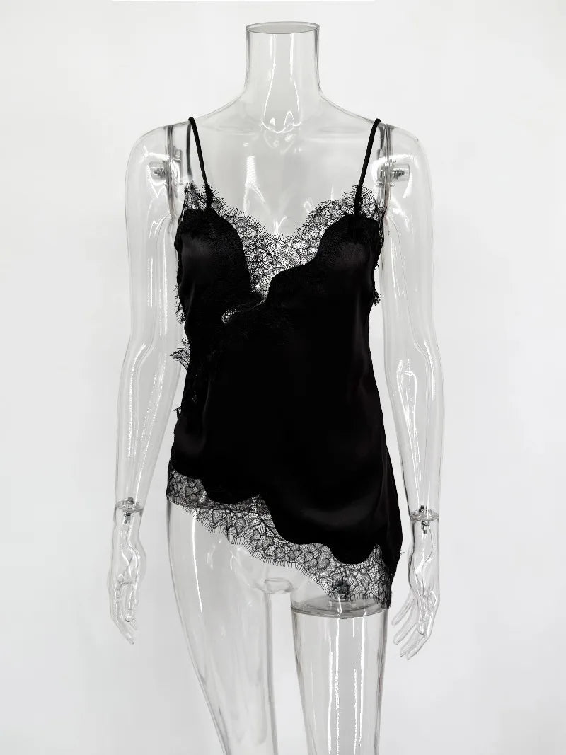 Black lace lingerie set on a transparent mannequin against a white background