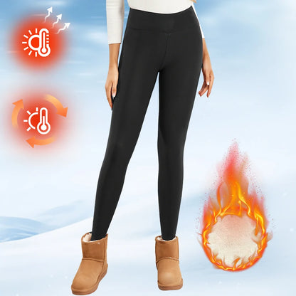 Person wearing black leggings with供暖图标and fire icon on a snowy background