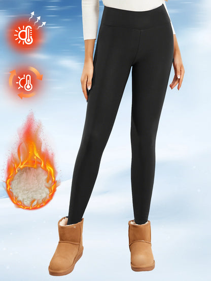 Person wearing black leggings with thermal graphics on a blue background