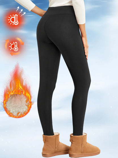 Person wearing black leggings with thermal graphics on a blue background