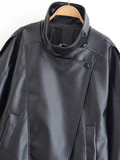 Black leather jacket on a hanger against a white background