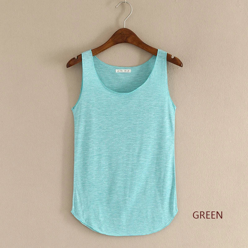 Turquoise tank top on a wooden hanger against a beige background