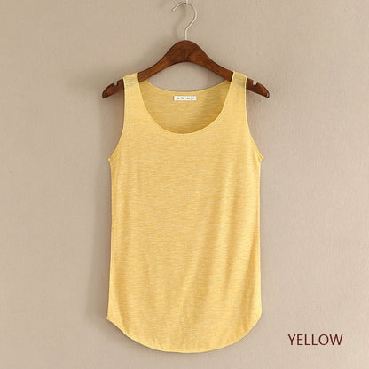 Yellow tank top on a wooden hanger against a beige background
