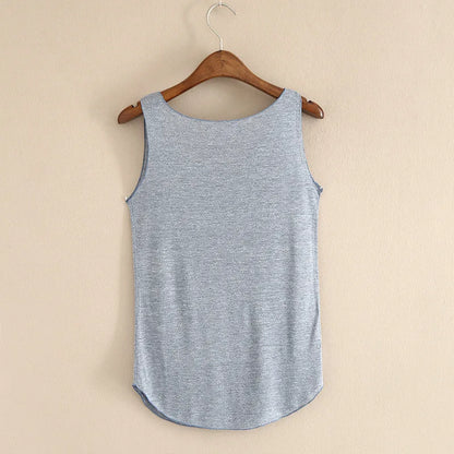Blue sleeveless shirt on a wooden hanger against a beige background
