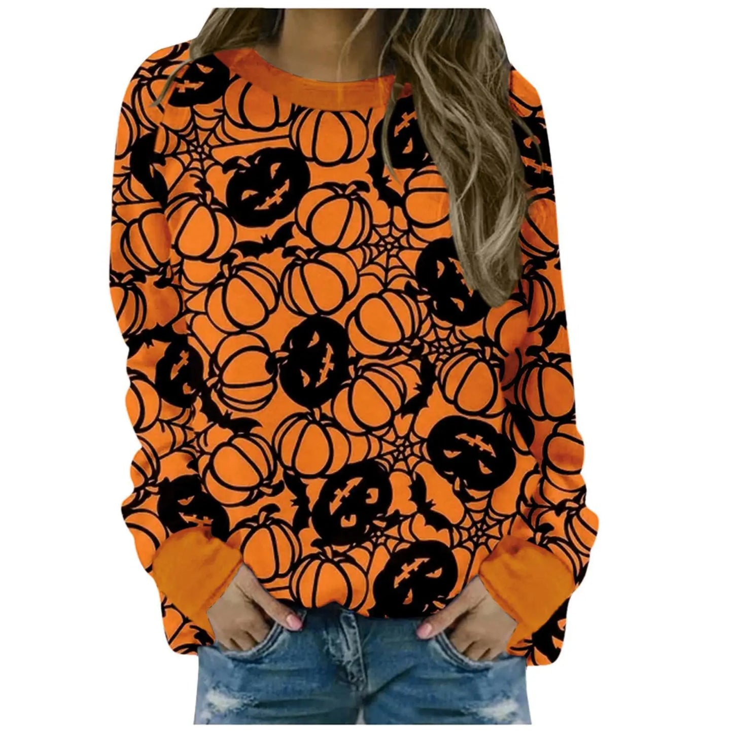 Orange sweatshirt with black pumpkin and spider web pattern worn by a person.