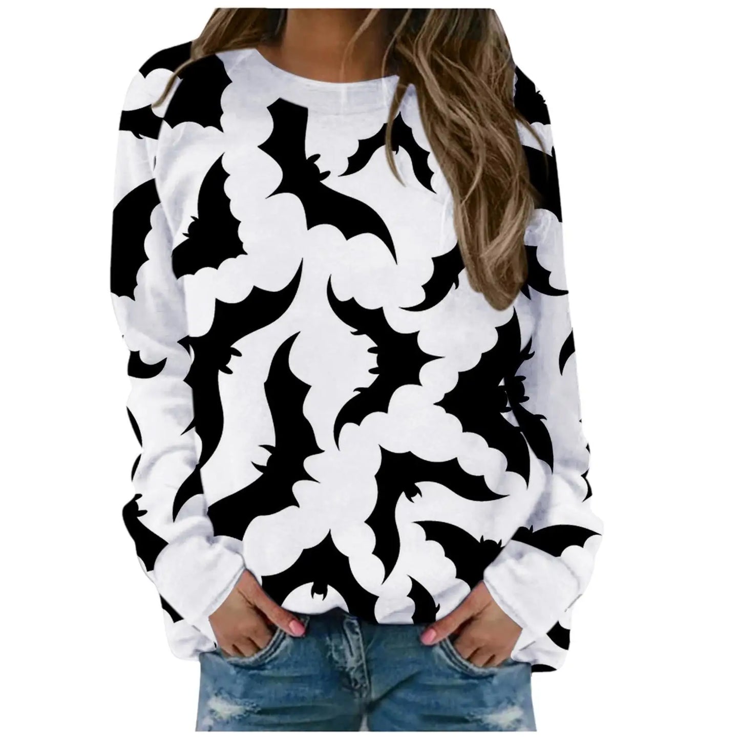 Black and white patterned long-sleeve shirt worn by a person on a white background