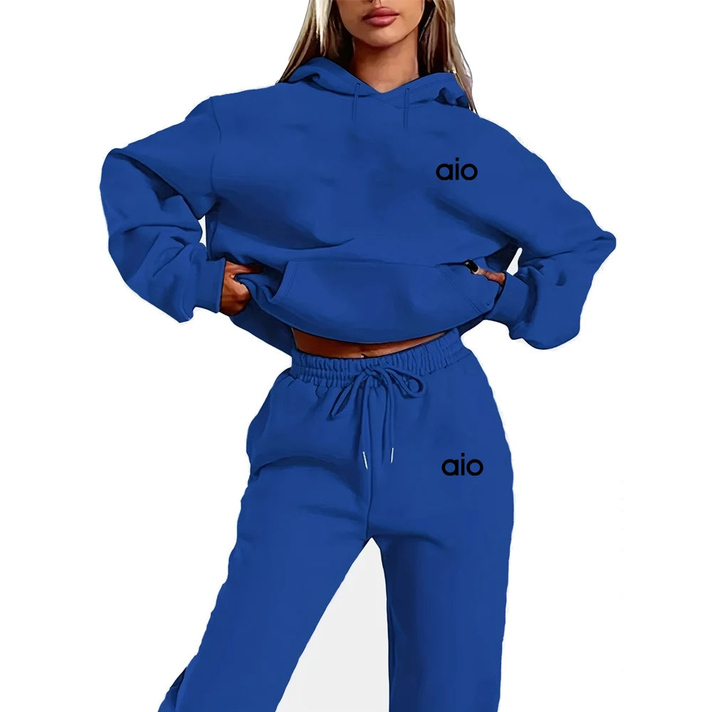 Blue tracksuit with 'aio' branding on a white background