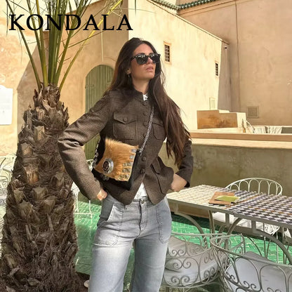Woman posing outdoors with 'KONDALA' branding