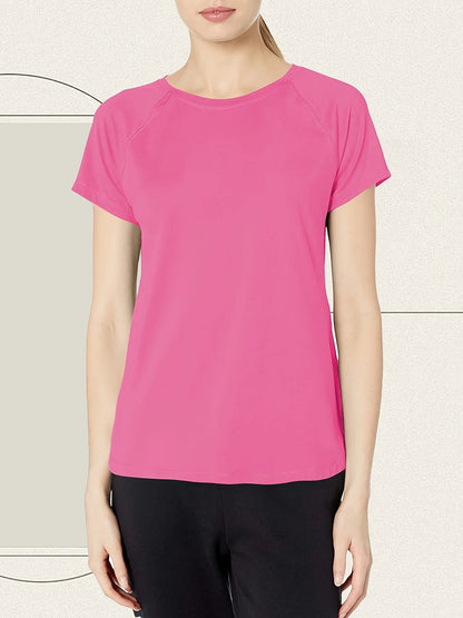 Person wearing a bright pink t-shirt against a neutral background