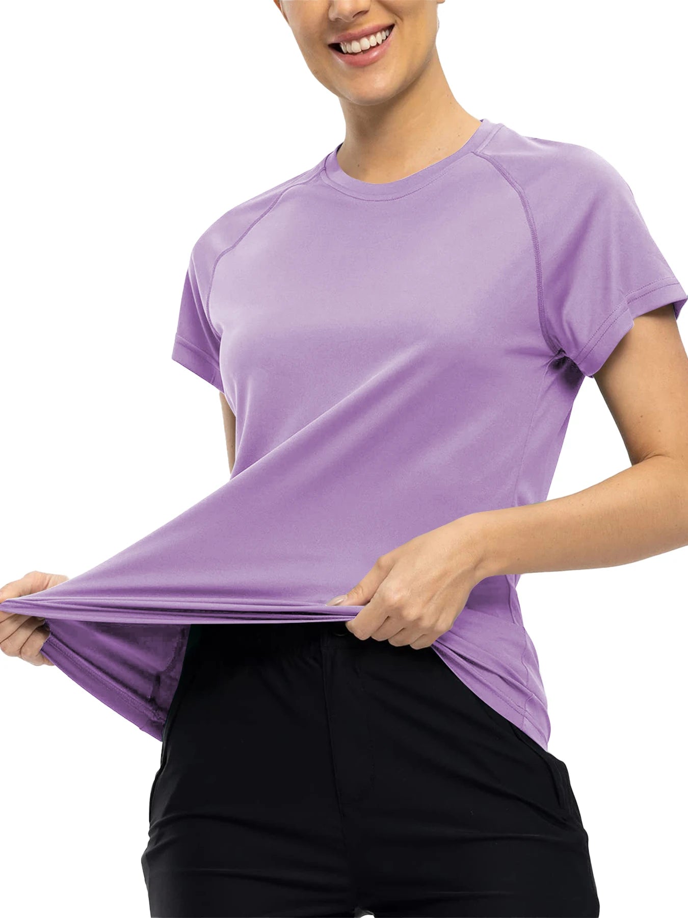 Person wearing a purple athletic shirt and black shorts on a white background