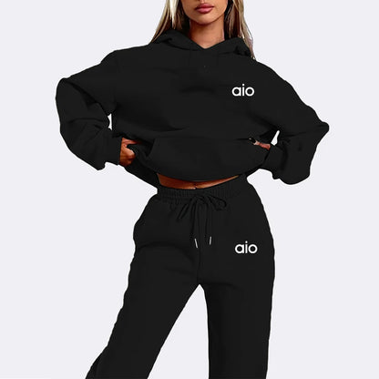 Black hoodie and pants set with 'aio' logo on a plain background