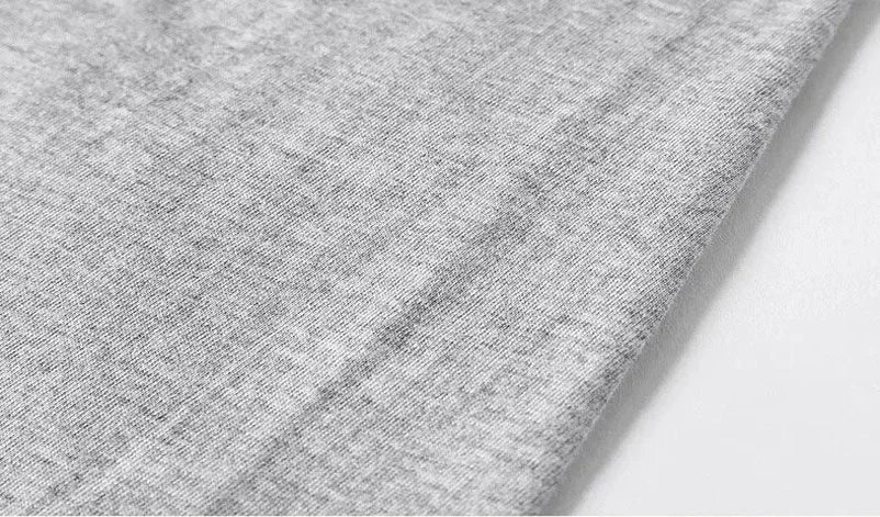 Close-up of gray fabric texture on a white background