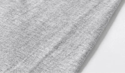Close-up of gray fabric texture on a white background