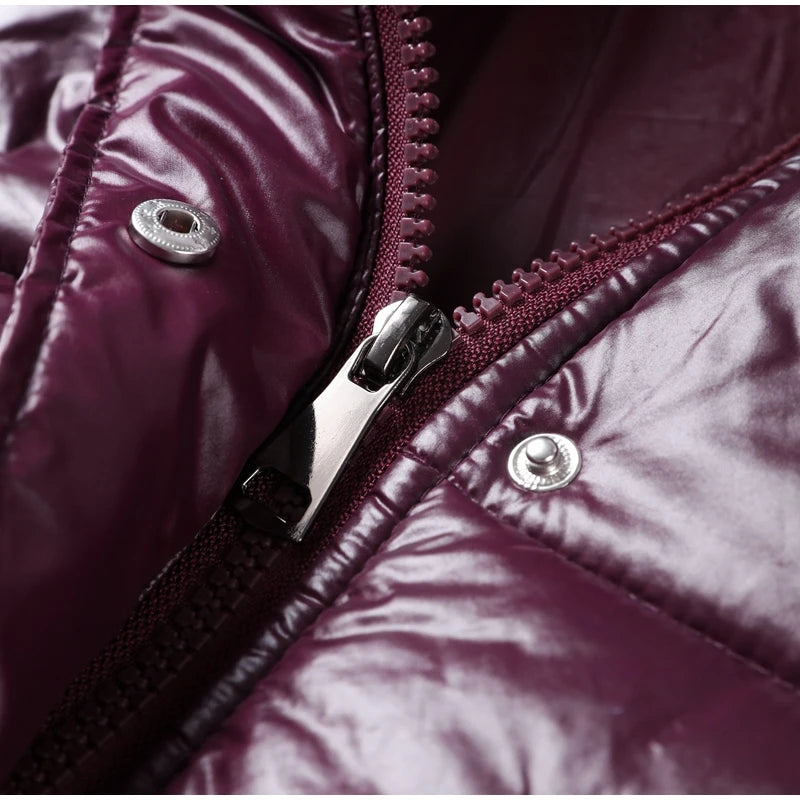Close-up of a purple jacket zipper with metallic pull