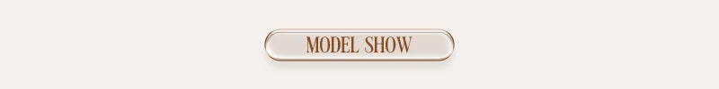 Rectangular sign with 'MODEL SHOW' text on a beige background