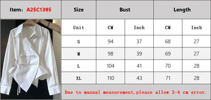 White shirt on a hanger with size chart below