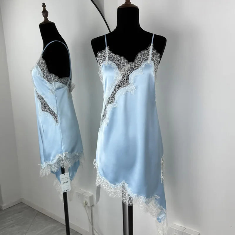 Light blue satin nightgown with lace details on a mannequin against a white background.