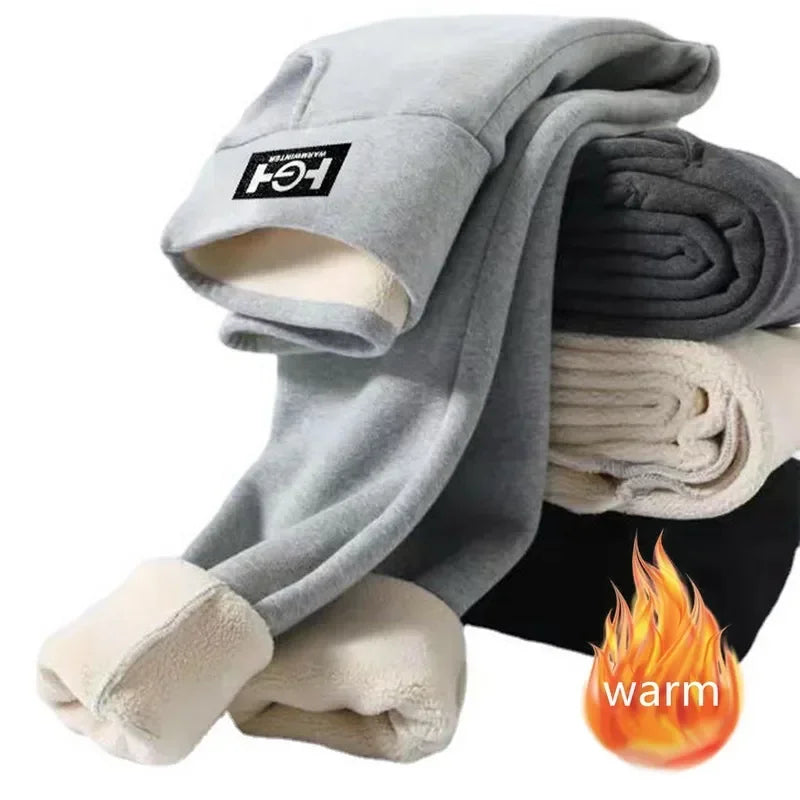 Stack of folded fleece blankets with a 'warm' icon on a white background