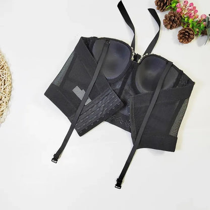 Black bra with mesh panels on a white background