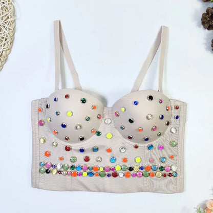 Beige bra with colorful gemstones on a white background
