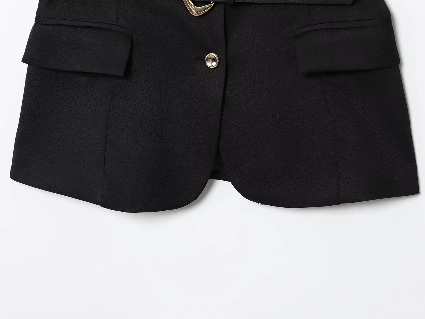 Black shorts with gold buttons on a white background