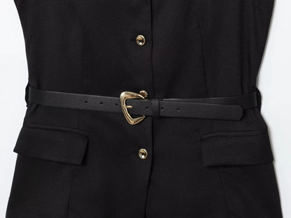 Black outfit with a belt and gold buttons on a white background