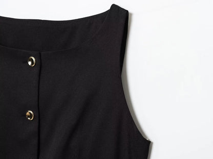 Black sleeveless top with gold buttons on a white background