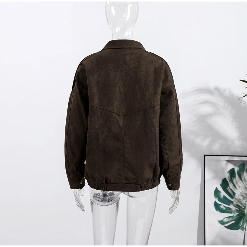 Brown suede jacket on a mannequin against a white background