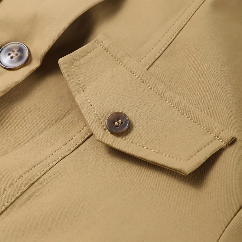 Close-up of a beige jacket with button details