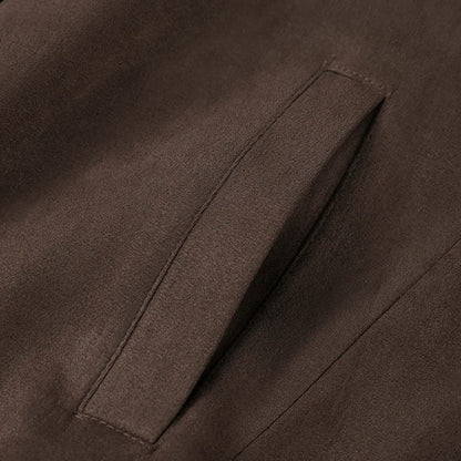 Close-up of a brown fabric with a pocket detail