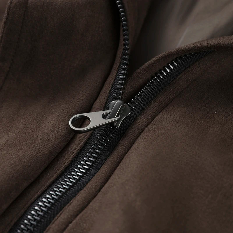 Close-up of a zipper on a brown jacket