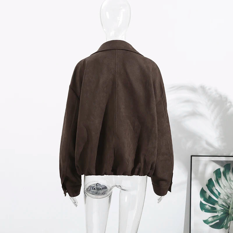 Brown jacket on a mannequin against a white background