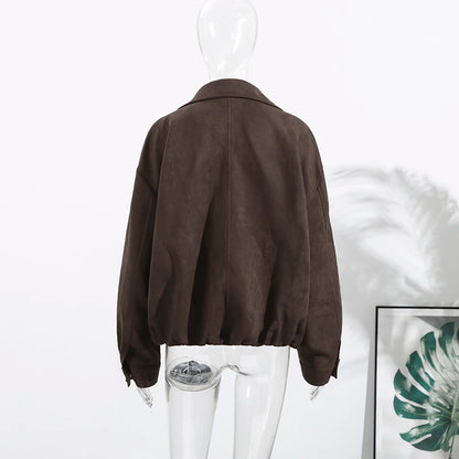 Brown jacket on a mannequin against a white background