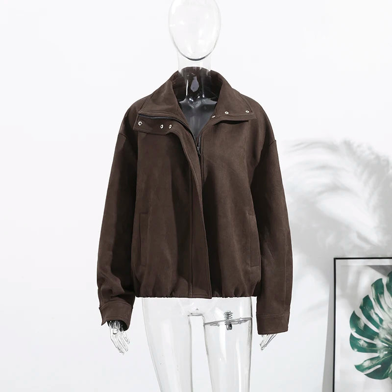 Brown jacket on a mannequin against a white background