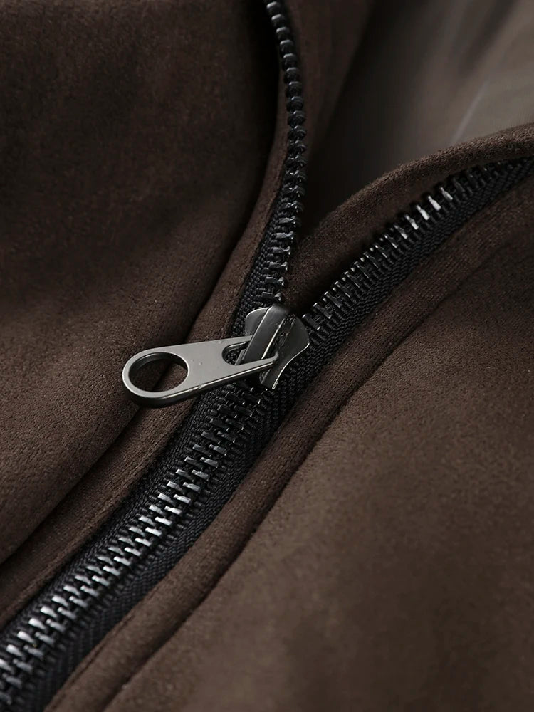 Close-up of a zipper on a brown jacket