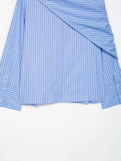 Blue and white striped shirt with a draped design on a white background