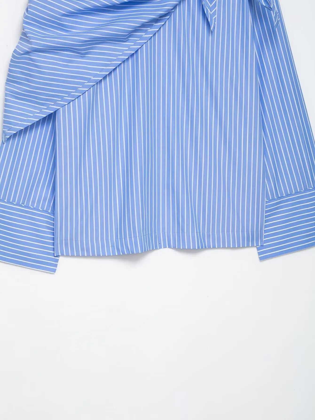 Blue and white striped shirt with a tie detail on a white background