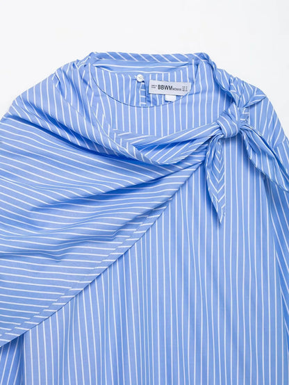 Blue and white striped shirt with a tie detail on a white background