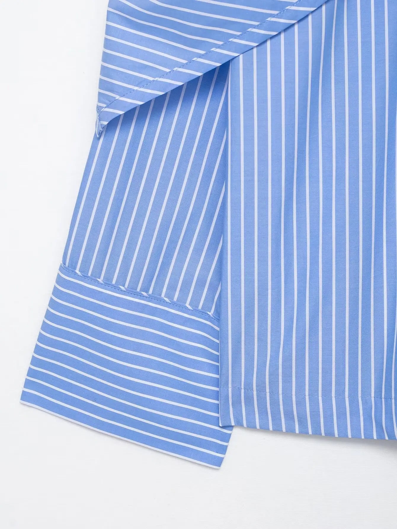 Blue and white striped fabric on a white background