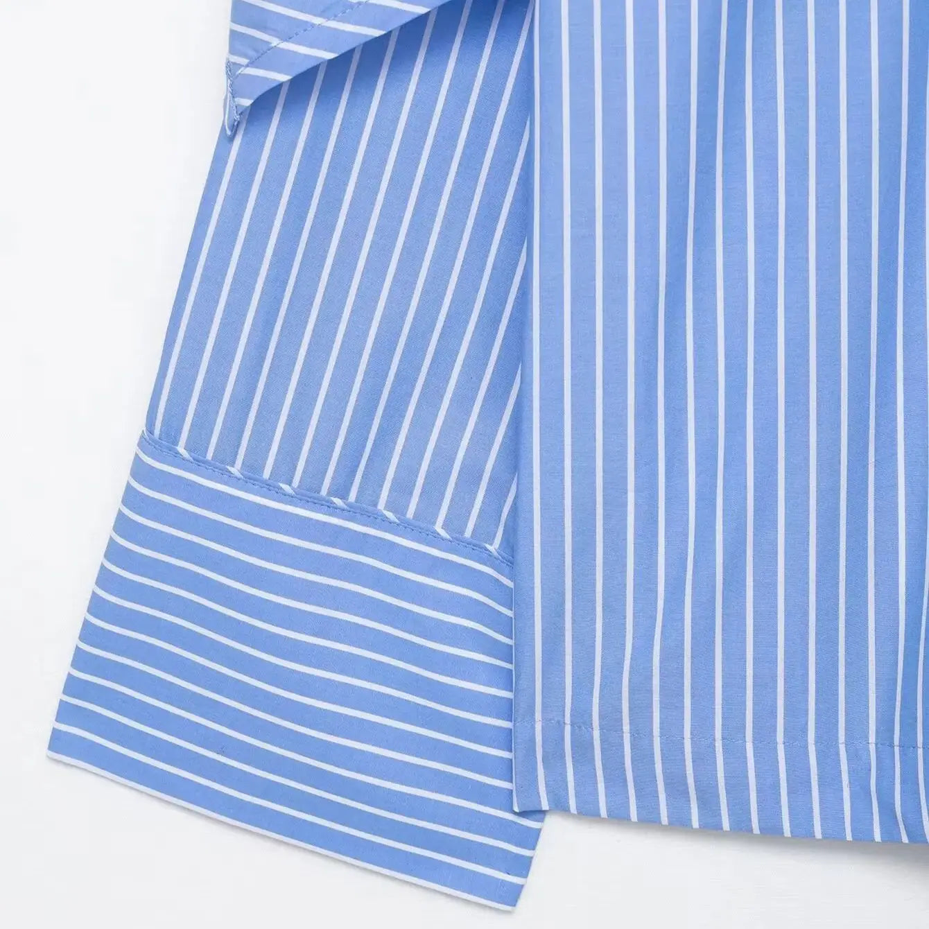 Blue and white striped fabric on a white background