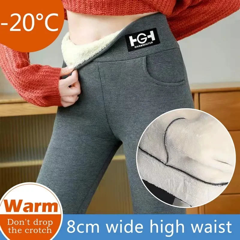 Gray high-waisted pants with a brand logo, showing warmth feature and 8cm wide high waist text.