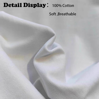 Close-up of white fabric with text indicating 100% cotton, softness, and breathability.