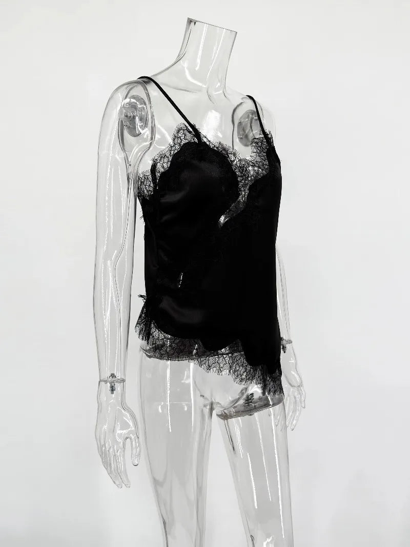 Black lace top and shorts on a transparent mannequin against a white background