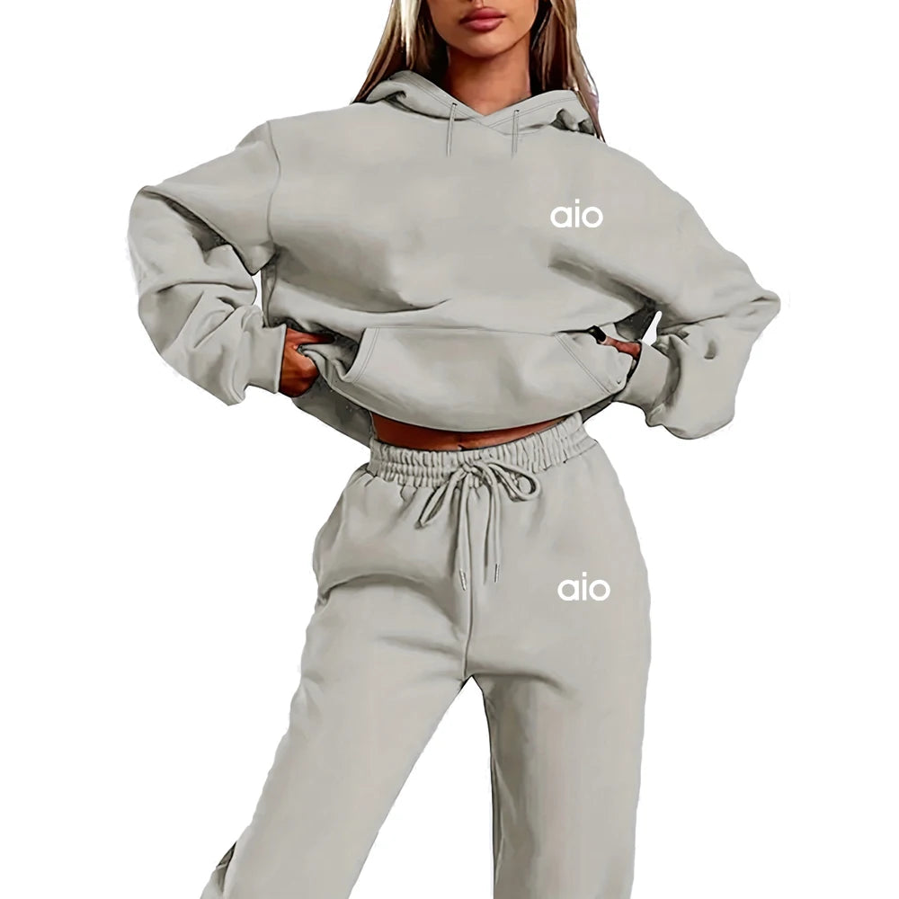 Gray hoodie and sweatpants set with 'aio' logo on a white background