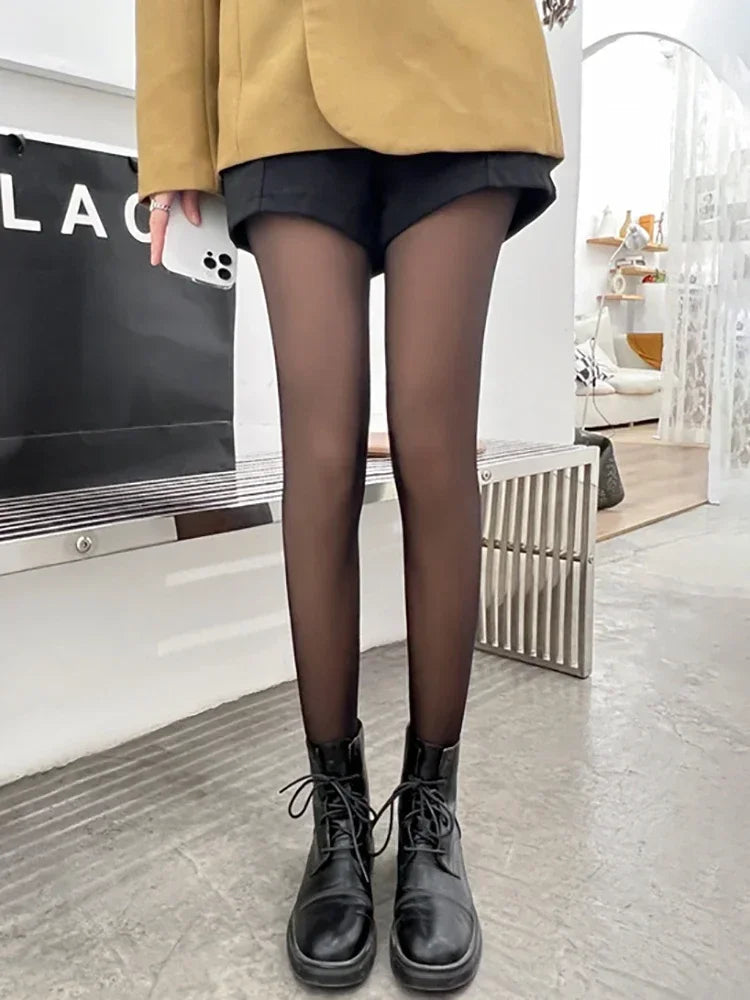 Evlira Black Thermal Tights with mustard jacket - trendy layered outfit with black shorts and boots
