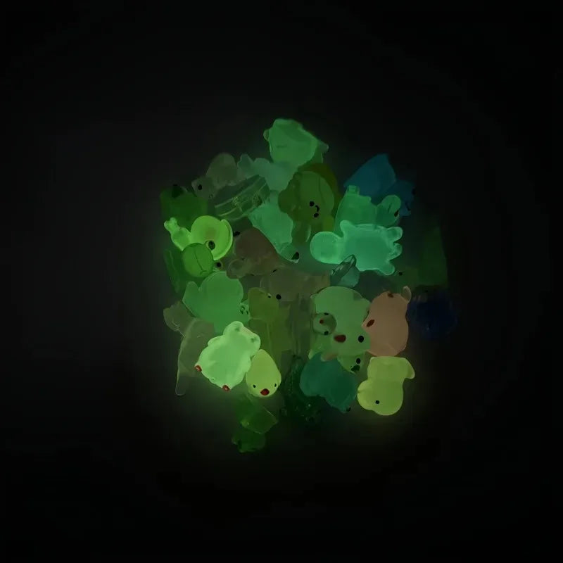 Evlira Luminous Frog Figurines - glowing green animal toys in dark demonstrating glow in the dark effect
