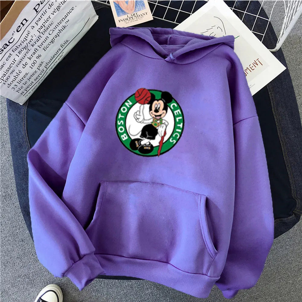 Purple hoodie with Boston Celtics logo featuring Mickey Mouse on a surface.